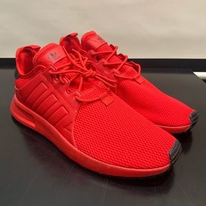 Adidas brand new red sneakers. Size 9 USA.